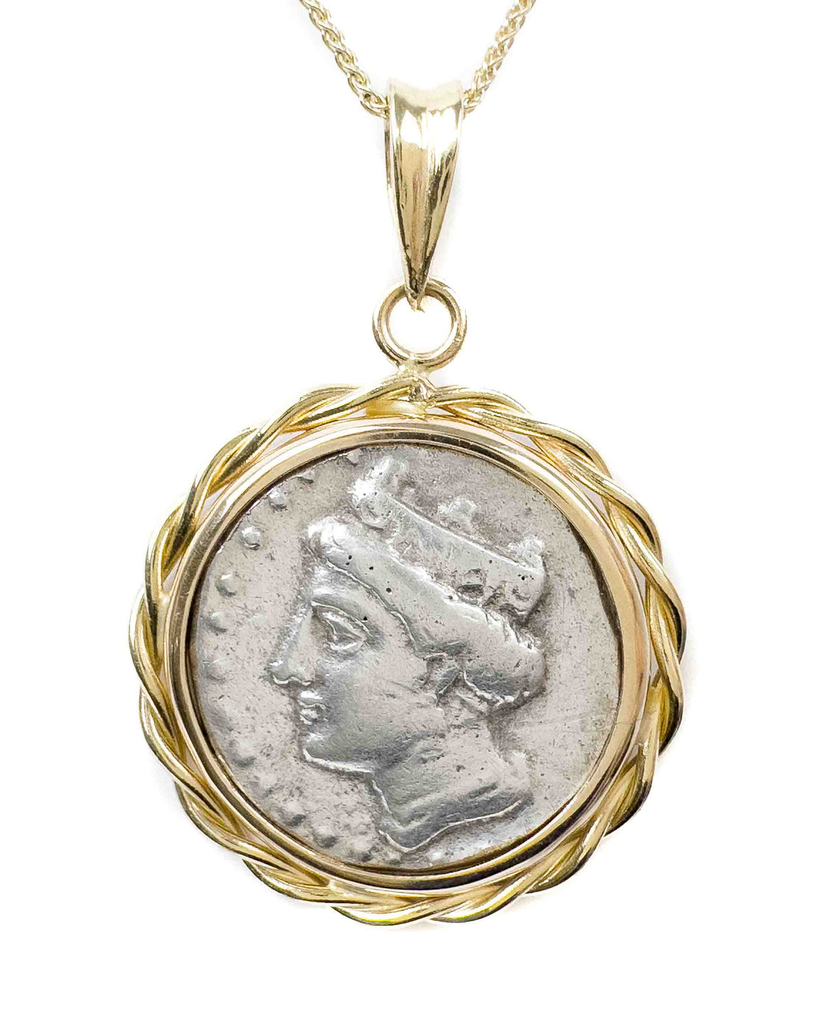 Close up of 14k Gold Rope decorated bezel with silver real ancient Greek drachma coin featuring the goddess Hera wearing a stephane